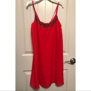 Strappy red dress with bead details